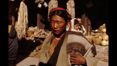 Nepal 1970s, A woman standing in street during daytime
