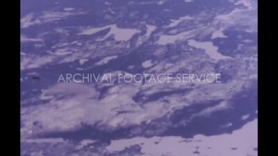 Archival footage of clouds and snow during daytime