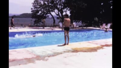 Mexico 1970s, Swimming pool with adults view during daytime