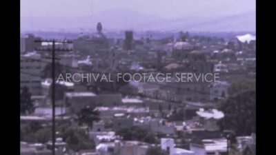 Mexico 1970s, Aerial view of a city with buildings and trees