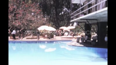 Mexico 1970s, Swimming pool view in Olmec colossal heads