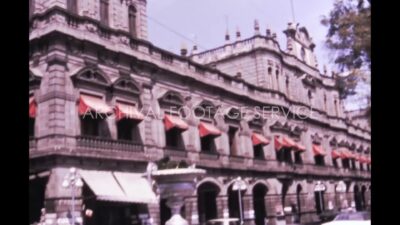Mexico 1970s, A large architecture view beside street at daytime