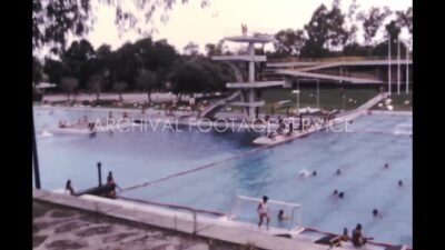 Mexico 1970s, Swimming pool view with adults and children
