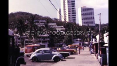 Mexico 1970s, Street view with car parking and building