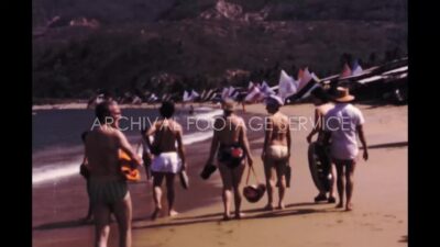 Mexico 1970s, Adults enjoying in ocean beach during daytime