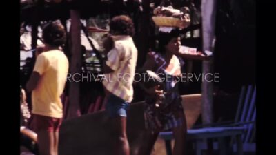 Mexico 1970s, Pacific ocean beach area view with adults activities