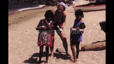 Mexico 1970s, Adults and children passing time in ocean beach