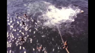 Mexico 1970s, People swimming in ocean during daytime