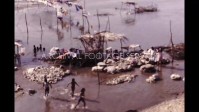 Mexico 1970s, People washing and drying clothes near river