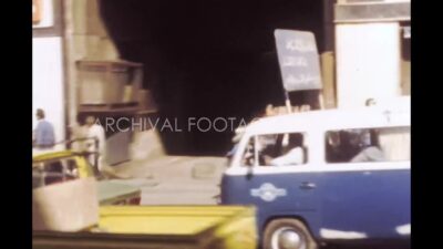 Egypt 1970s, A city view with shop, street and vehicles