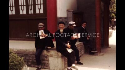 China 1980s, Four old people sitting in outside during daytime