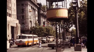 China 1980s, Movement of car in intersection of road during daytime