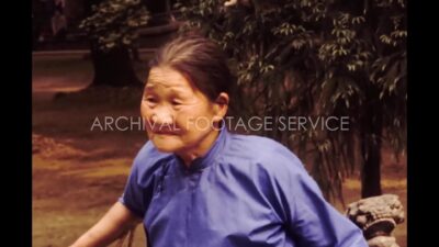 China 1980s, Old man and woman view in outside during daytime