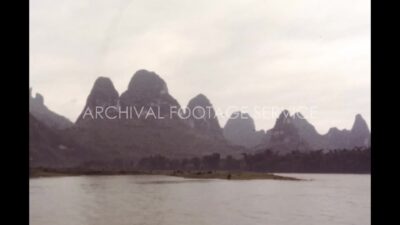 China 1980s, River view beside rocky mountain during daytime